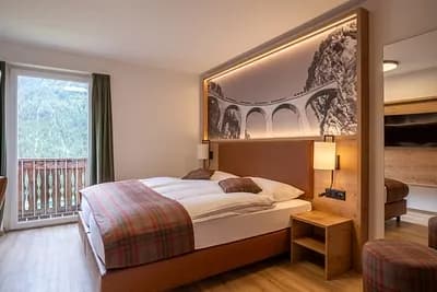 MANU Lodge Grischuna Innenzimmer